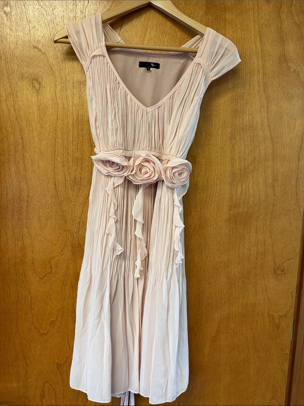 Ryu Soft Blush Pleated Midi Dress with Floral Sash